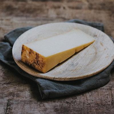 Quicke's Oak Smoked Goat Cheddar