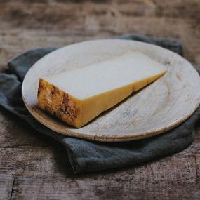 Quicke's Oak Smoked Goat Cheddar